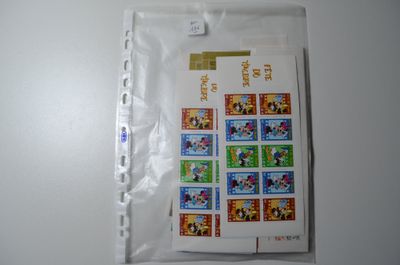 a picture of a picture of mickey mouse stamps on a piece of paper
