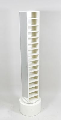 a tall white bookcase with many shelves on it