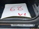 a piece of paper taped to the back of an oven door