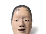 l'image d'un masque représentant un homme sur fond blanc