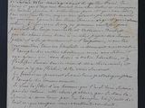 a piece of paper with writing on it sitting on top of a table