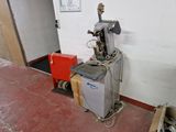 a machine that is sitting on the floor in a room