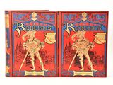 pair of red and blue cards with a picture of a man holding a sword