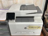 a printer that is sitting on top of a desk