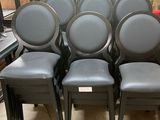 a lot of chairs that are sitting in a room