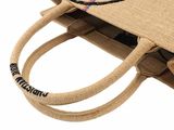 a jute bag with a handle and a handle on it