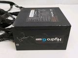 a close up of a black power supply box with a power cord
