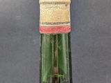 a bottle of wine that is sitting on a table