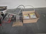 a box of batteries sitting on a table next to a box of batteries