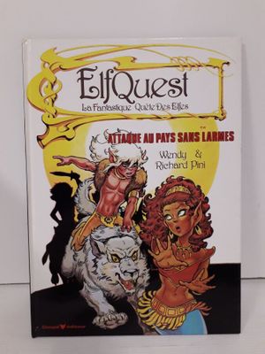 un livre sur lequel figure une image représentant une femme et deux chats