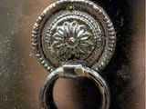 a ring that is sitting on a door handle