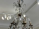 a chandelier hanging from the ceiling in a room