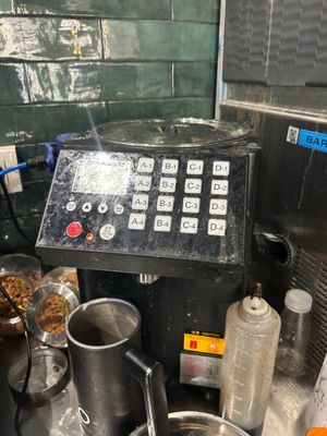 an image of a kitchen with a lot of pots and pans on the counter