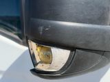 a close up of a car ' s side view mirror