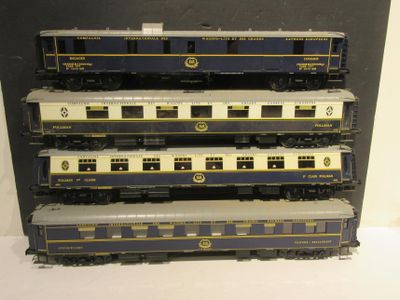 five train cars that are stacked on top of each other