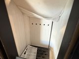 a small bathroom with a toilet and a sink