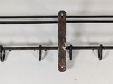 a picture of a rack with hooks and hooks on it