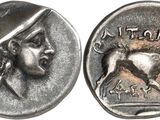 a silver coin with an image of a man riding a horse