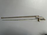 two swords that are on the wall next to each other
