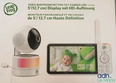 a box with a picture of a baby monitor and a cell phone