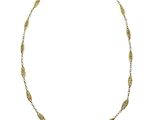 a gold chain necklace with a leaf design on a white background