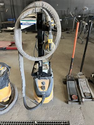 a machine that is sitting on the floor next to other machines