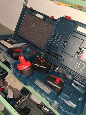 a tool box with tools in it in a garage