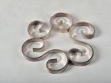 four rings that are sitting on a table