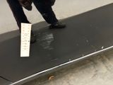 a man that is standing on top of a skateboard