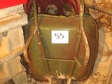 a wheelbarrow with a number on it in a room