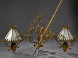 an image of a chandelier with two lamps and a rope