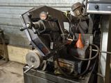 an image of a machine that is sitting in a garage