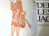 un livre ouvert sur lequel figure le dessin d'un homme tenant une batte de baseball