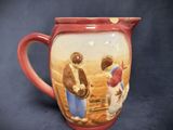 a ceramic pitcher with a painting of a man and a woman on it
