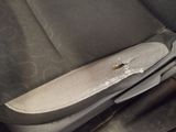 a car seat with a hole in the middle of it
