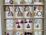 a display case with a lot of buttons in it