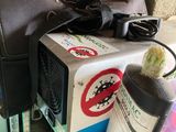 a brown bag and a black bag sitting on a table