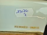 a close up of a vase with a label on it
