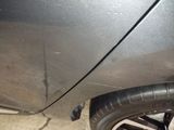 a close up view of a car ' s tire and rim