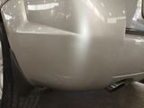 a close up of a car ' s rear bumper
