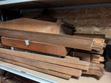 several pieces of wood are stacked on top of each other