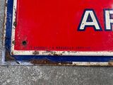 a red and white sign with a blue and white arrow on it