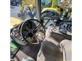 a view of the inside of a bus from the driver ' s seat