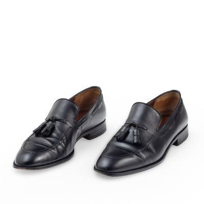 black leather tasselled loafers with tassels