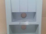 a white cabinet with a brown knob on it