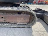 a close up of a bulldozer on the ground