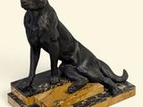 an image of a statue of a dog sitting on top of a marble block