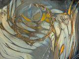 a close up of a glass vase with a design on it