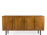 the sideboard is made of solid wood and has four doors and four drawers