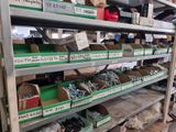 many boxes of screws on the shelves in the store